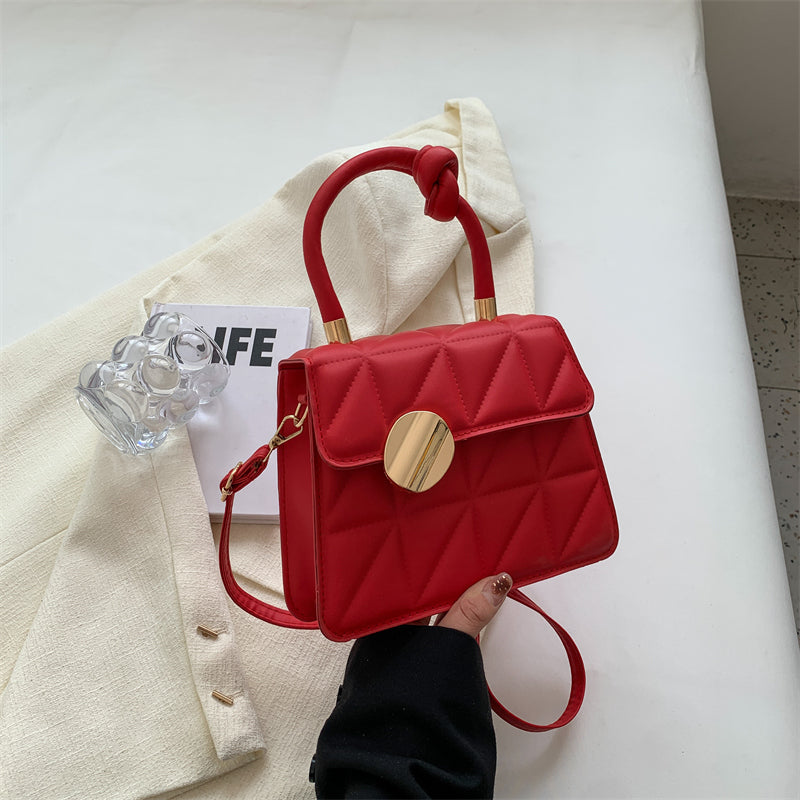 Petit sac à main au design géométrique
