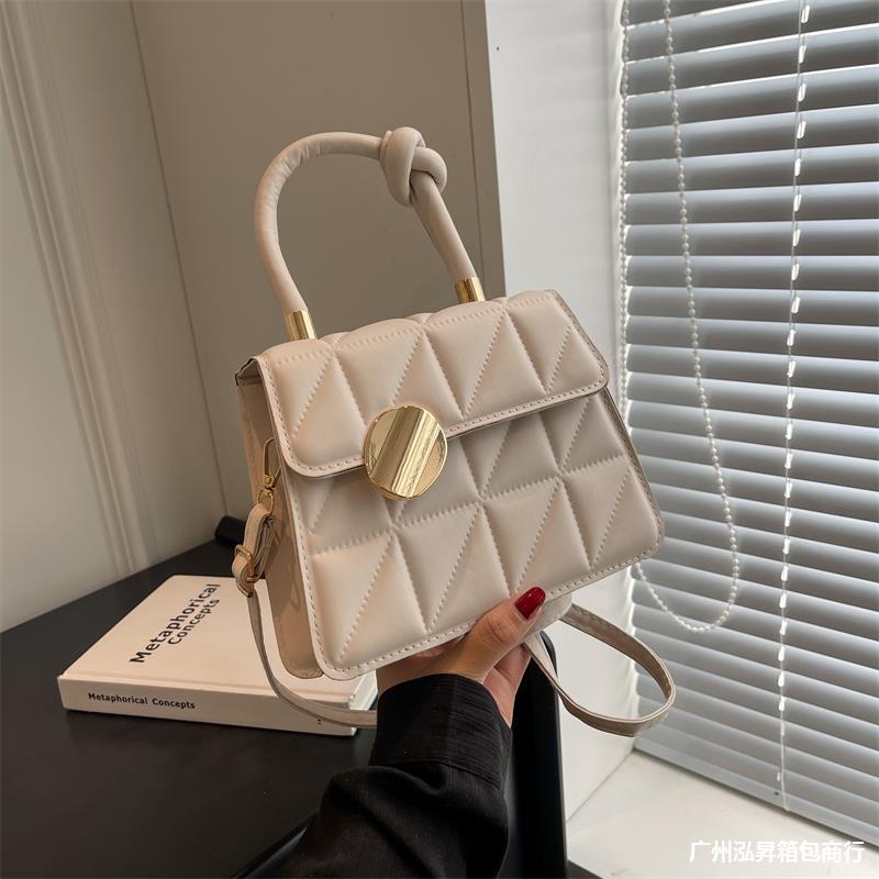 Petit sac à main au design géométrique