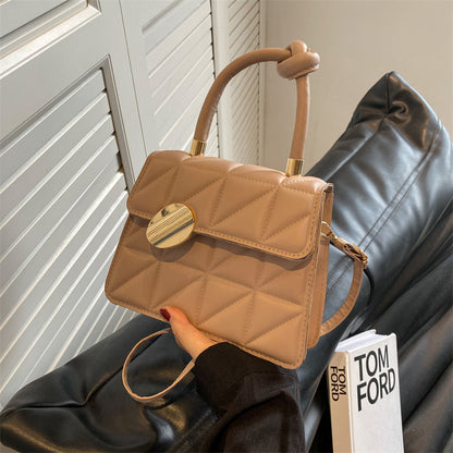 Petit sac à main au design géométrique