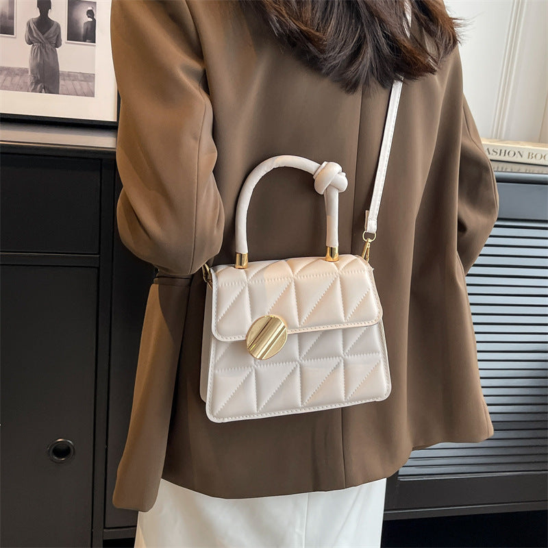 Petit sac à main au design géométrique