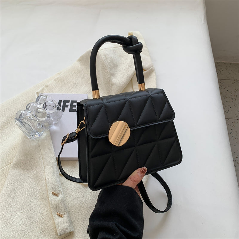 Petit sac à main au design géométrique