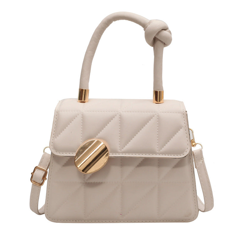 Petit sac à main au design géométrique