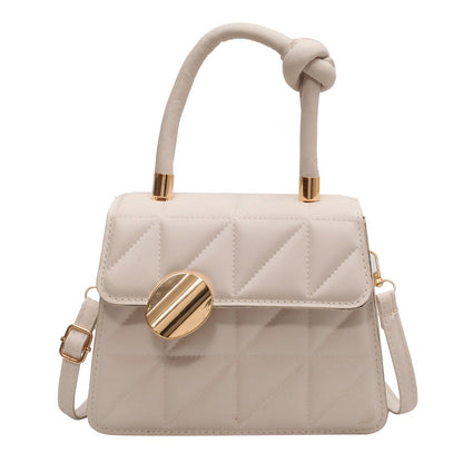 Petit sac à main au design géométrique