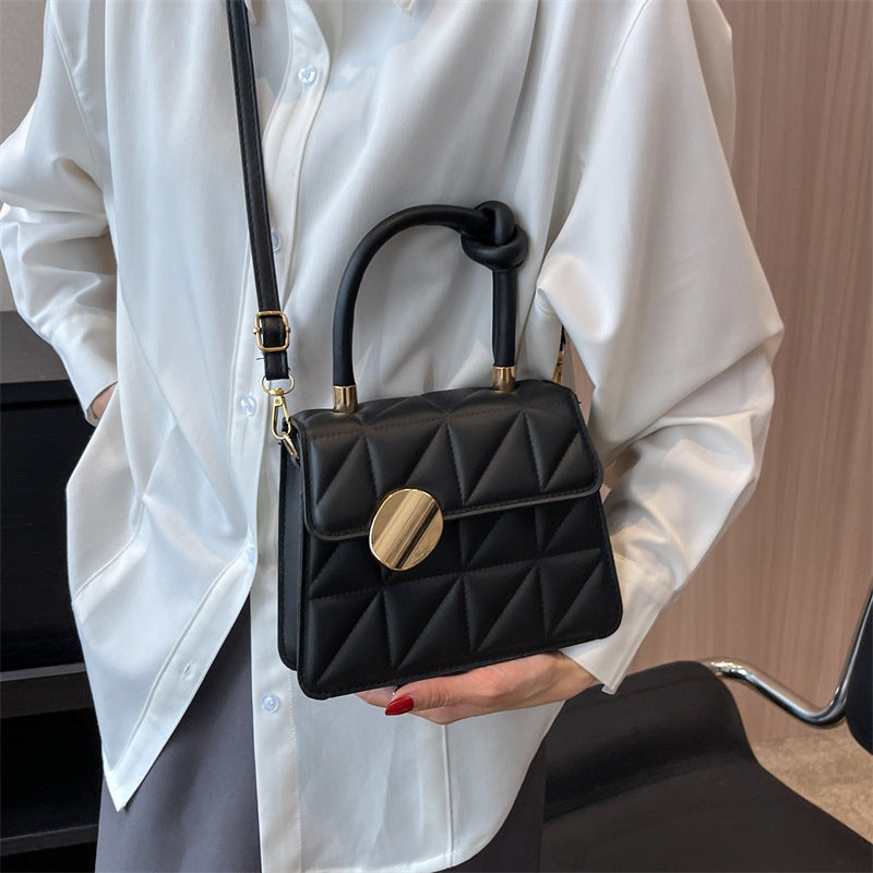 Petit sac à main au design géométrique